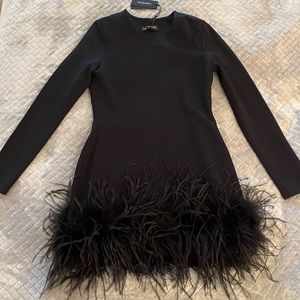 Chic feather trimmed cocktail dress